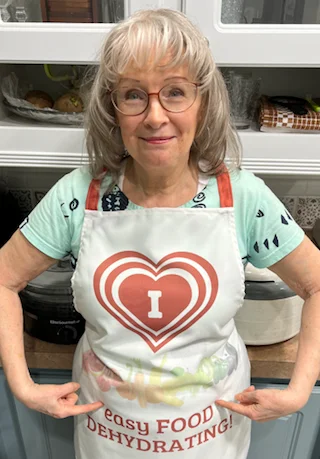 Susan wearing Easy Food Dehydrating apron